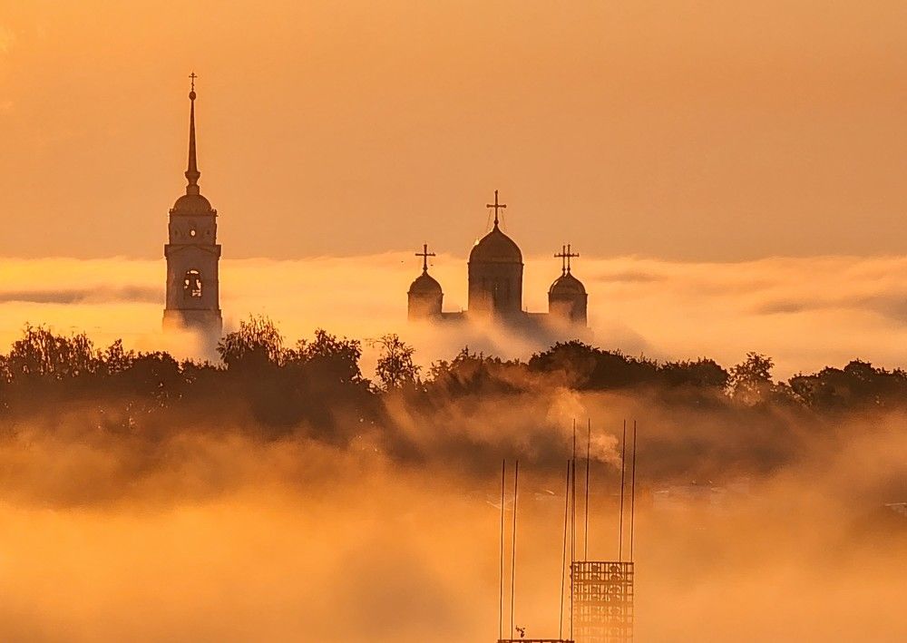 Domes in orange fog.
