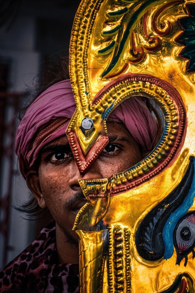 "Behind the Mask: A Glimpse into Tradition"