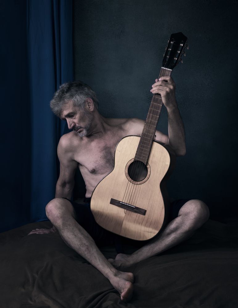 Старый гитарист