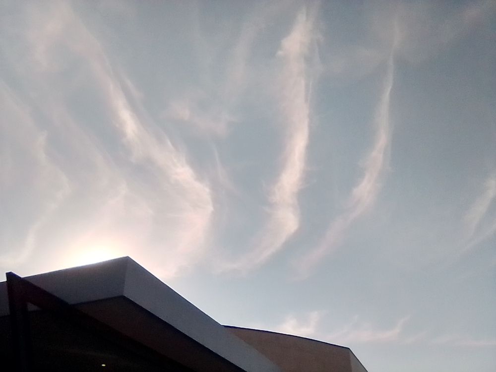 Cloudy evening over mall building