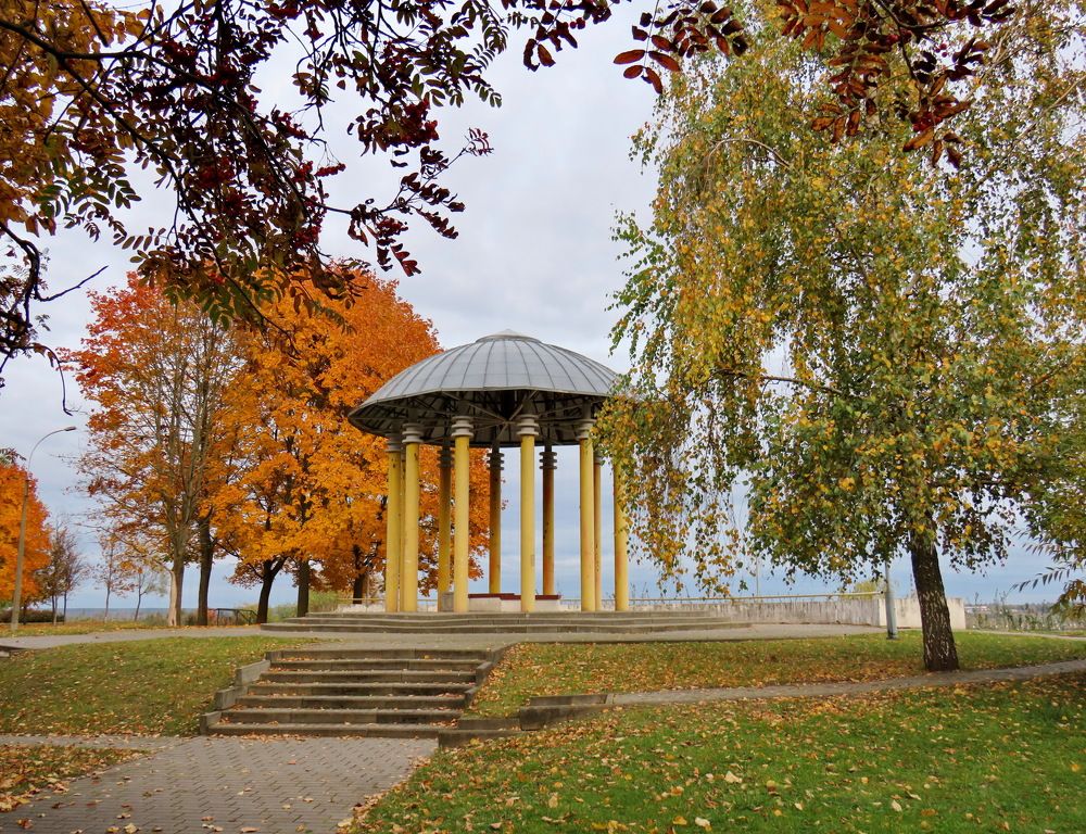 Autumn trees and gazebo in the city park