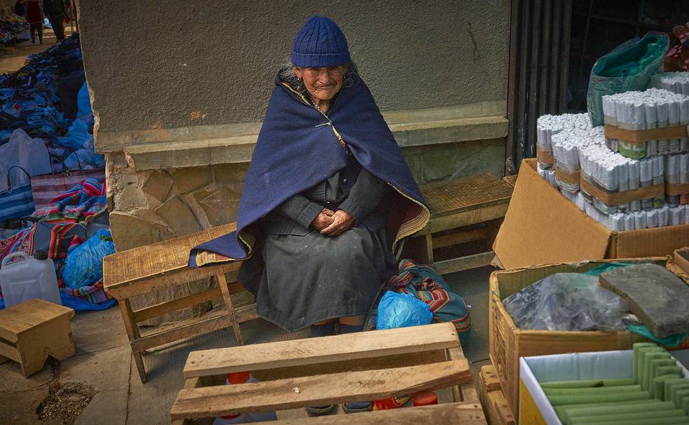 THE OLD WOMAN AT THE CORNER