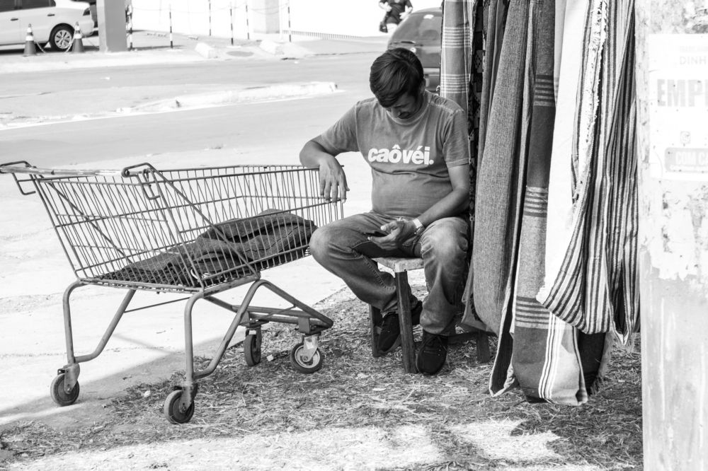 Salesman using his cell phone