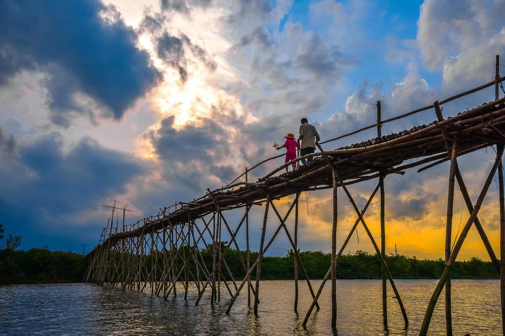 Father, daughter and sunset
