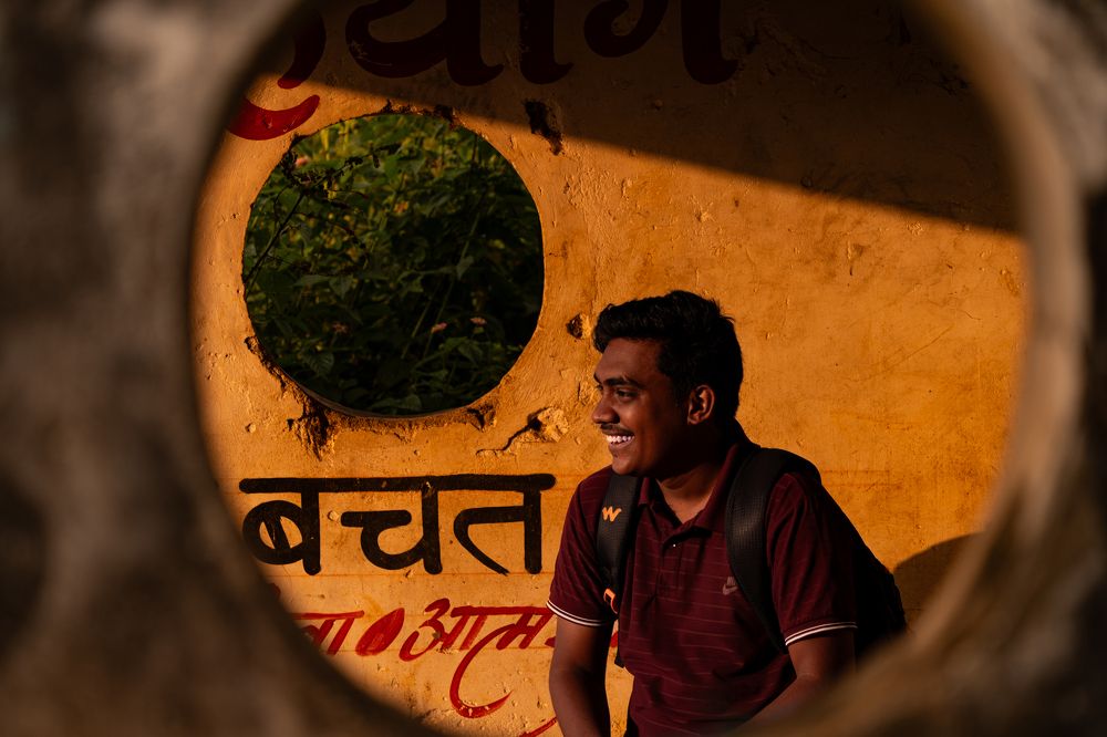 A smile from a window of a bus stop