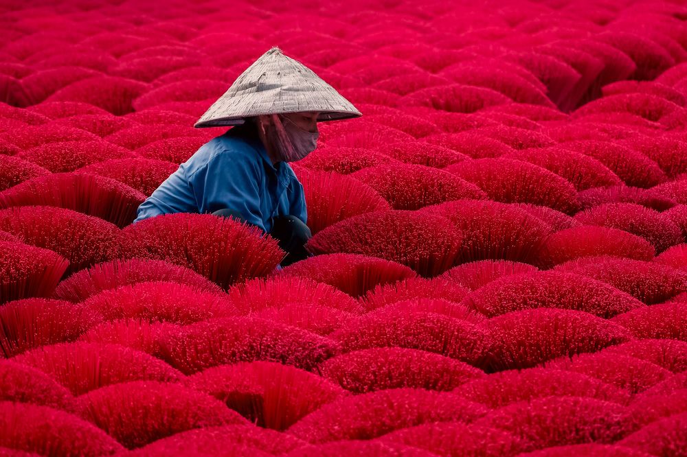 Among red incense sticks