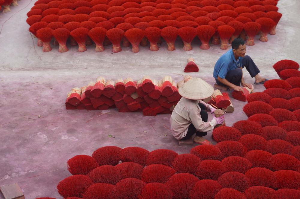 Daily life work of Joss stick workers at Quang Phu Cau Joss stick village, Hanoi, Vietnam