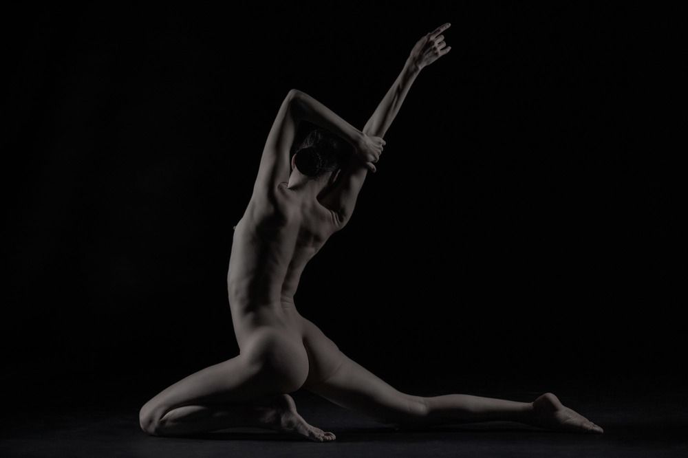 The Ballerina in the side shining light.