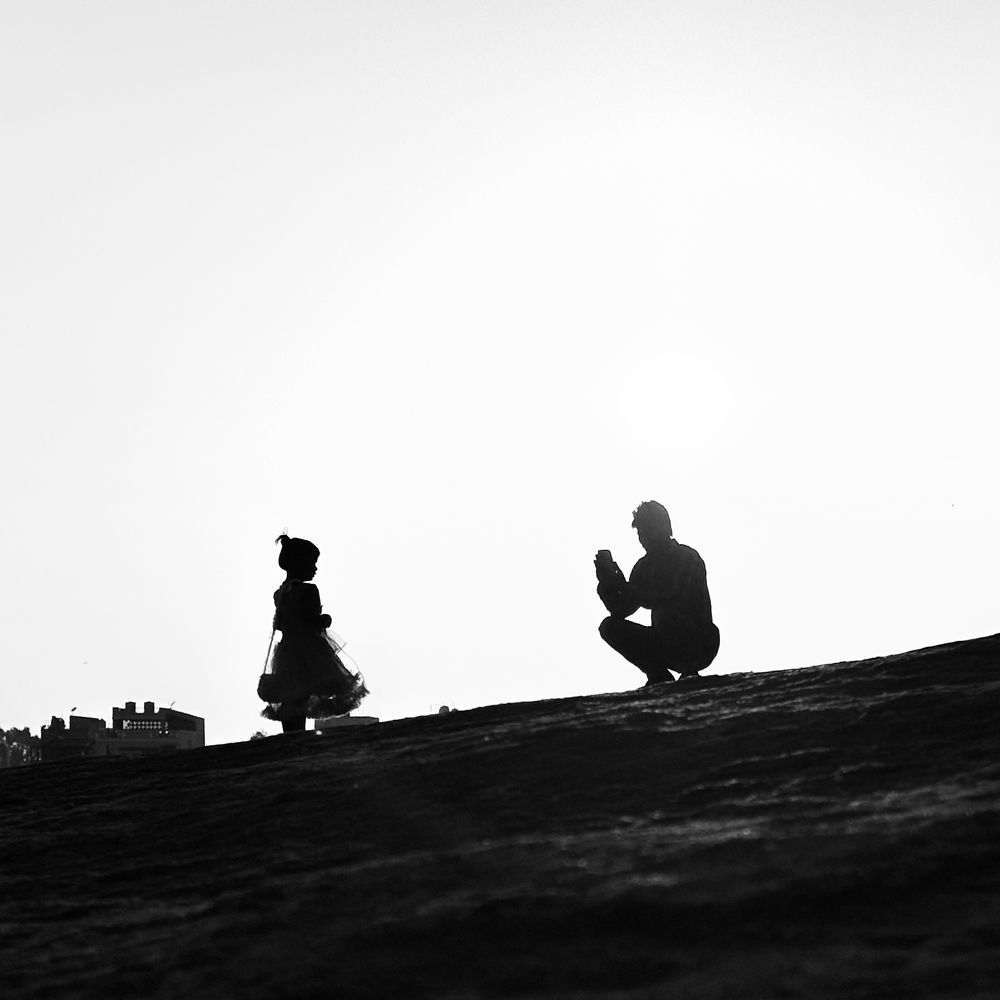 A Father taking pictures