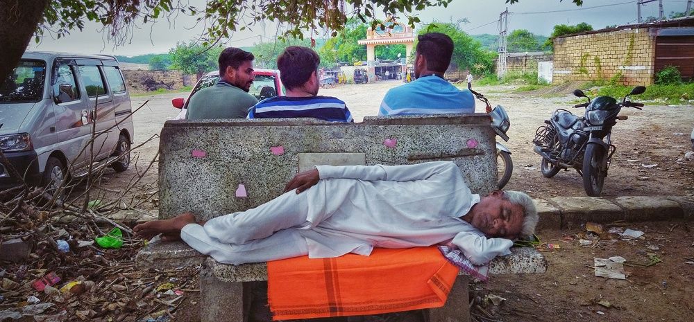 While the world talks, some find peace in the quiet moments of rest.