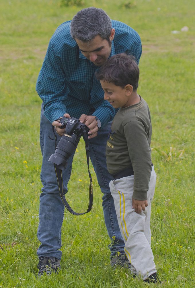 Photographer father and boy