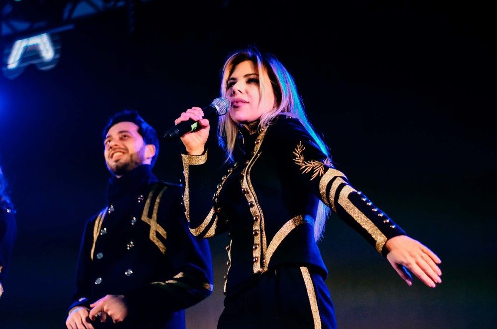 Under the bright spotlights