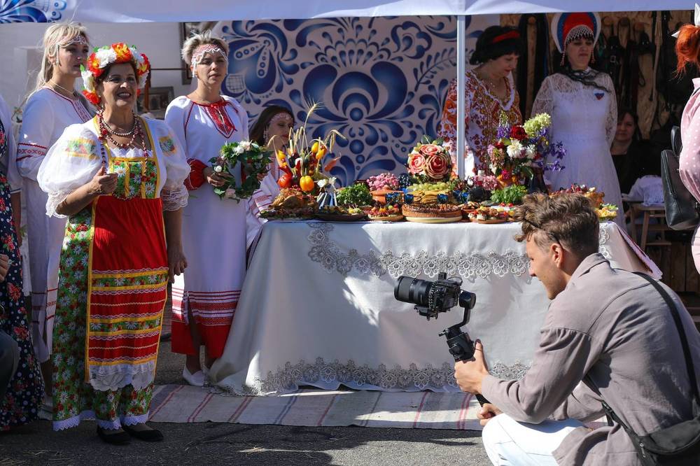 Фотограф на ярмарке