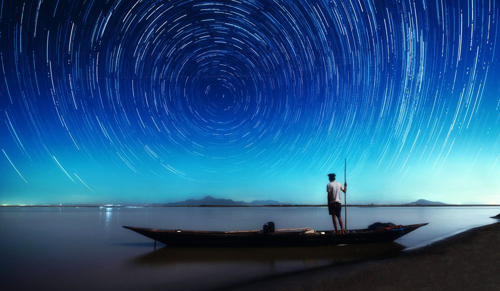 The boatman and the nightsky.