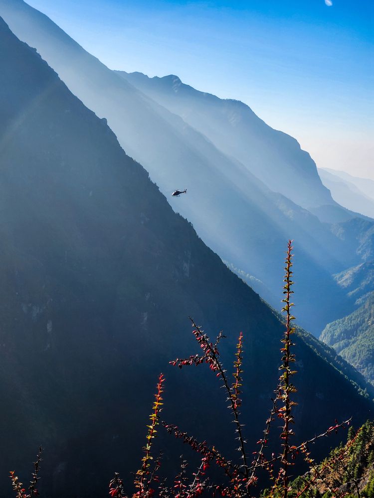 Helicopter in the Himalayan Mountains