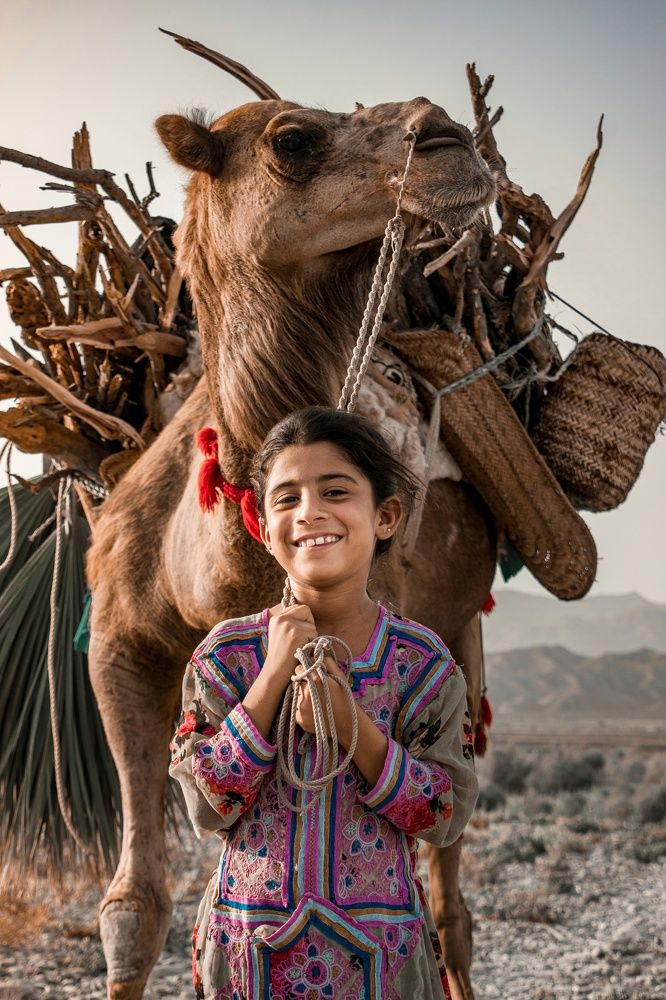 A beautiful Children with Camel