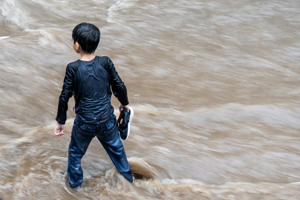 Playing under the rain