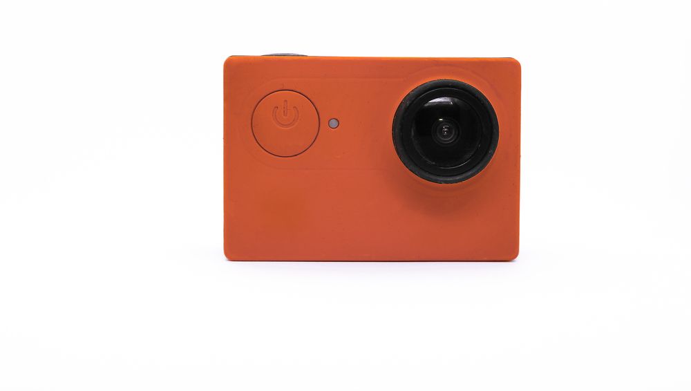 Small orange digital action camera