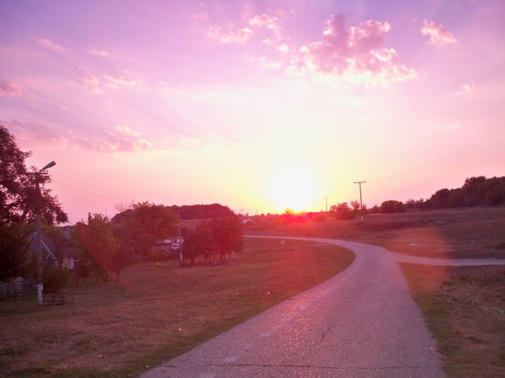 ...of this hill where the sun goes down there is a cemetery - there is the grave of my father when I pass by, I always see his big cross...