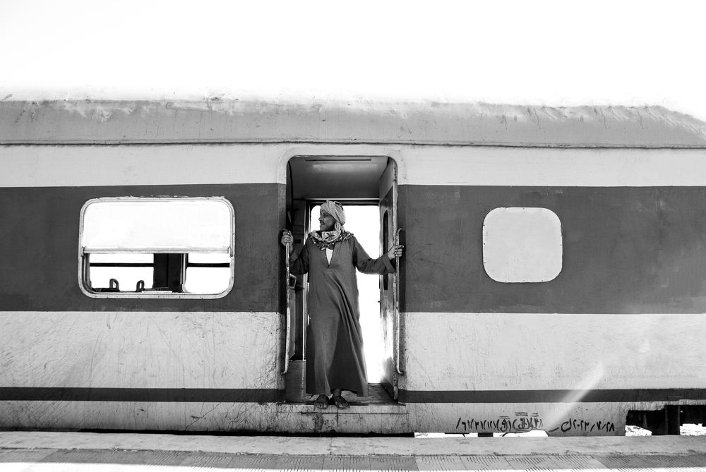 Waiting alone at the train door