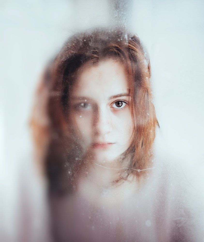 За запотевшим окном