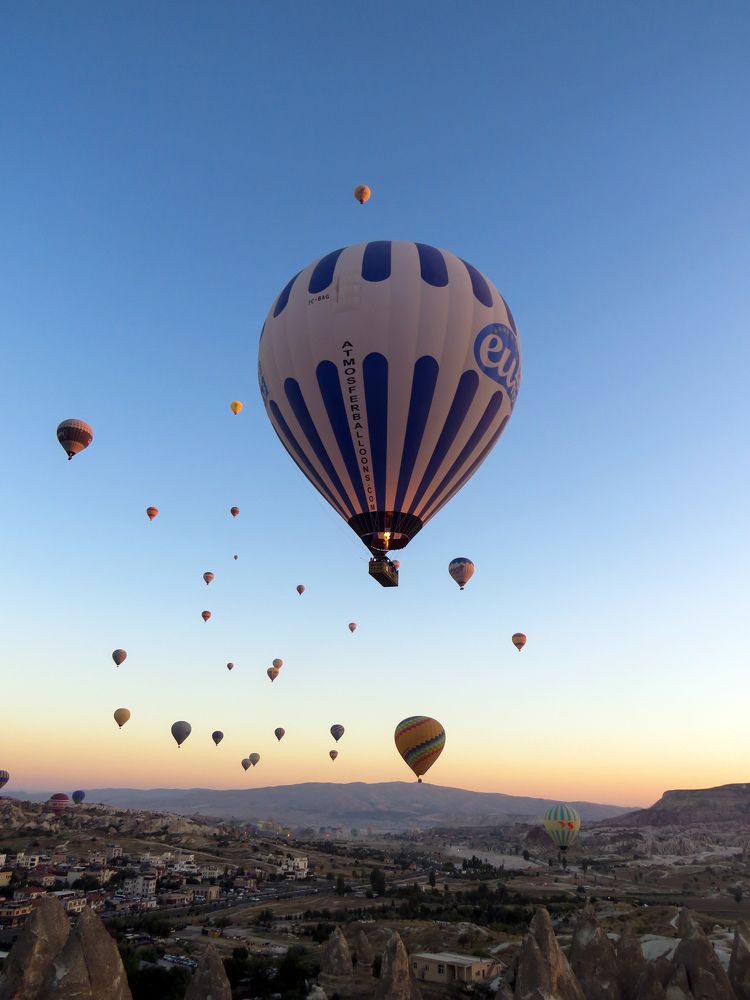 Hot air balloons in the sky at dawn