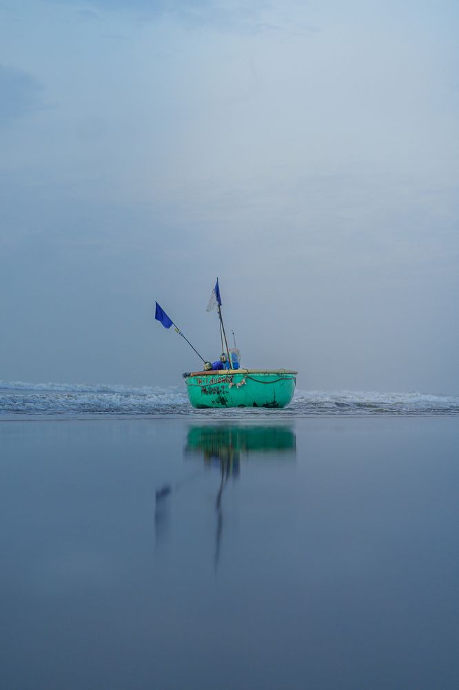 Tranquility Reflected: A Quiet Morning by the Shore