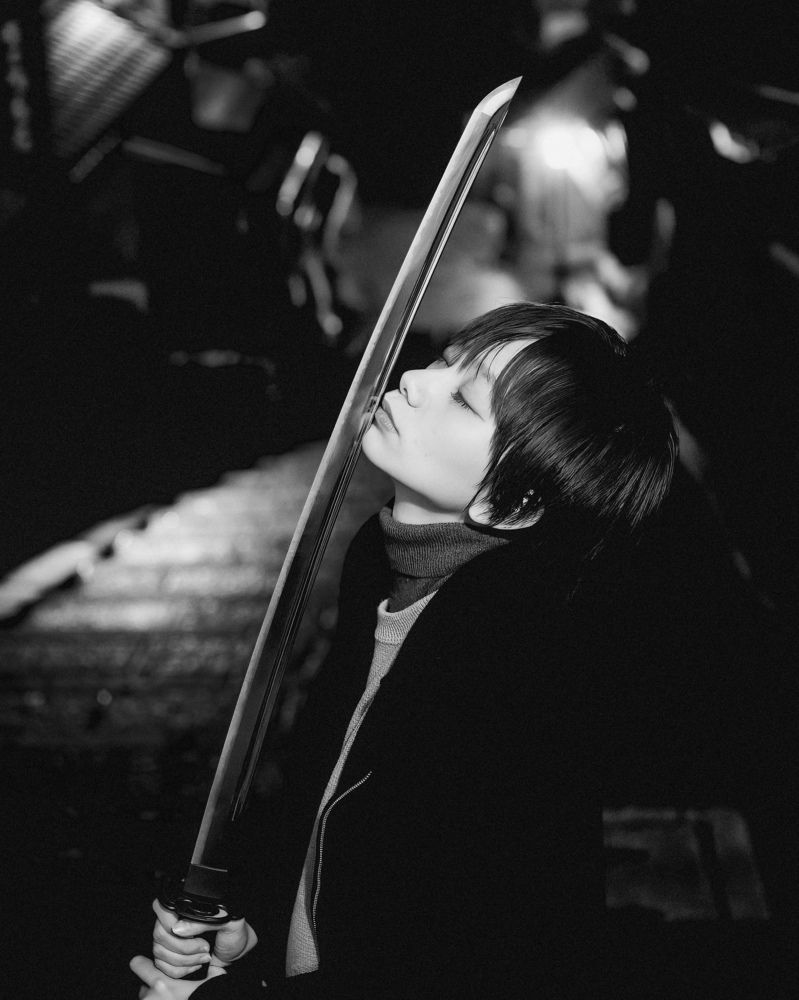 Kissing a Japanese sword...