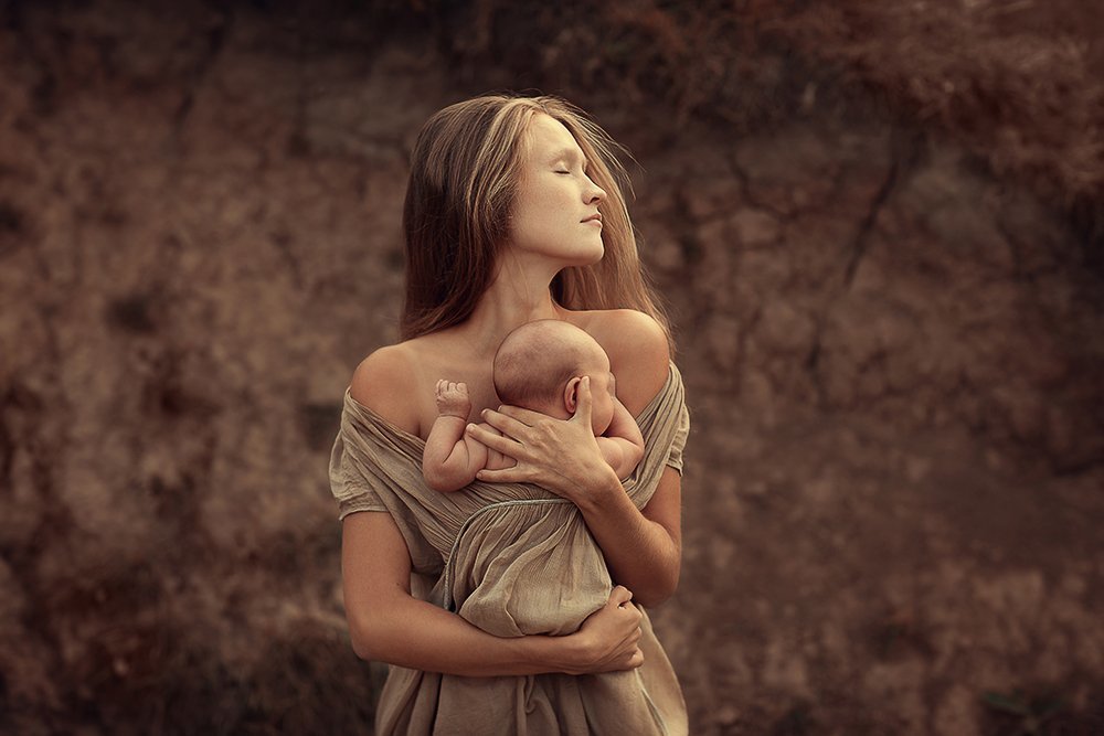 Материнство