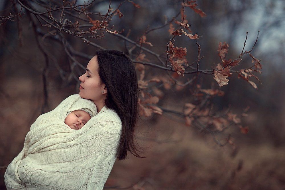 Материнство