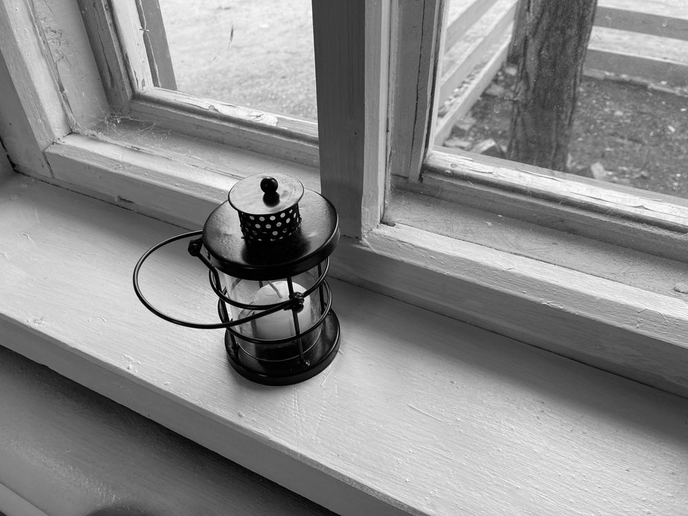 На подоконнике.