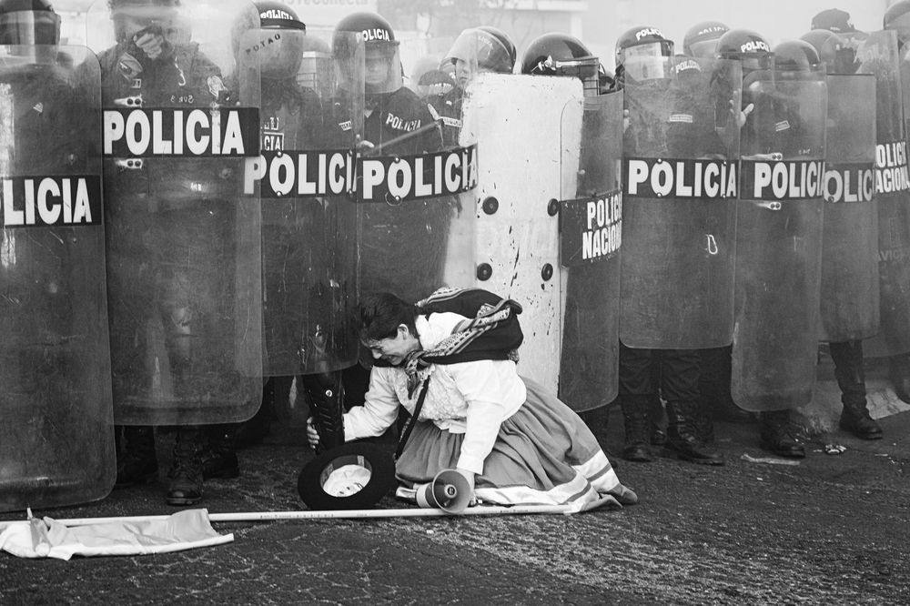 Arrested for waving the flag.