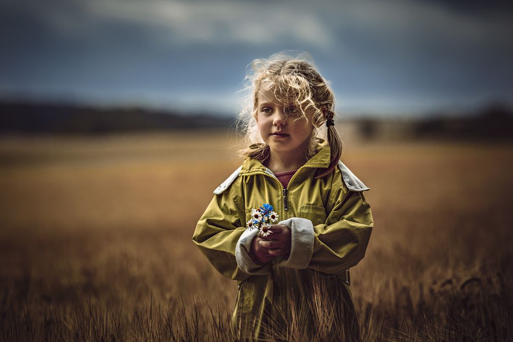 Standing with the flowers
