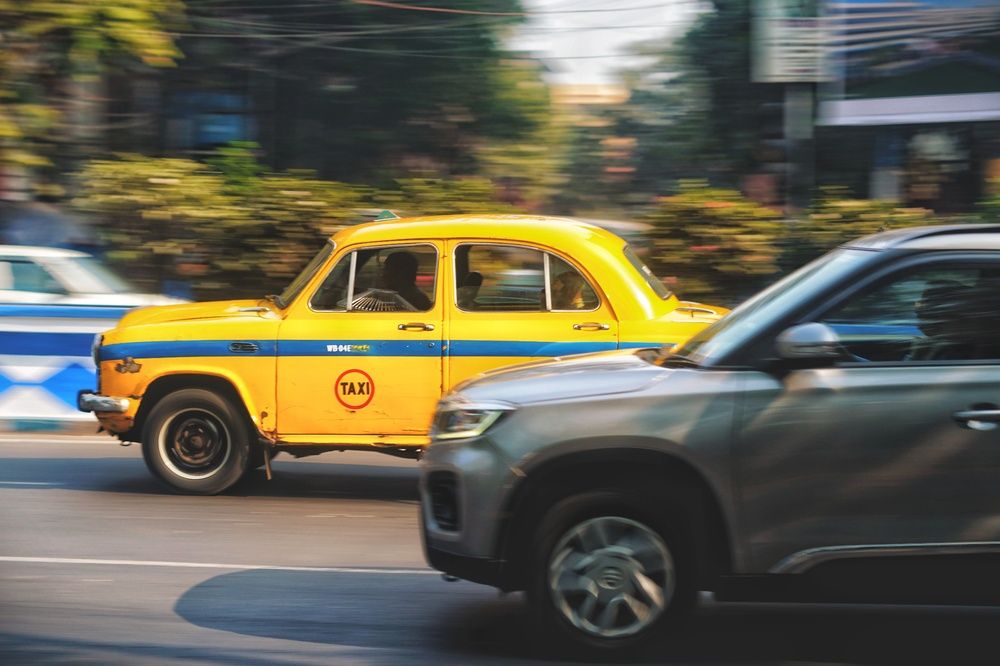 NEW PRIVATE CAR & A VINTAGE TAXI CAR IN KOLKATA