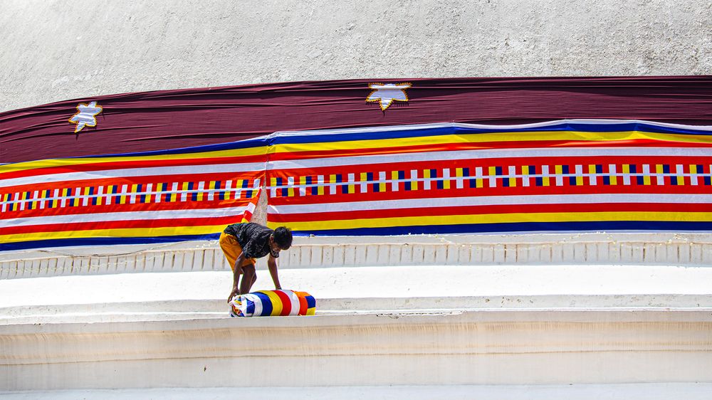 A man who decorates the Stupa