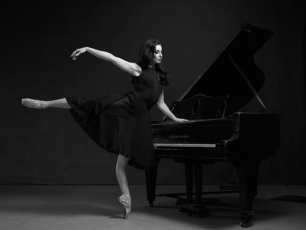 Portrait of prima ballerina Maria at the piano