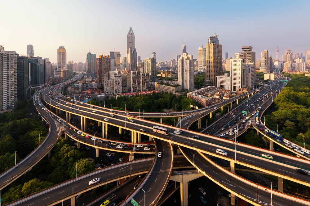The Intersection of Shanghai City's Speed and Skyline