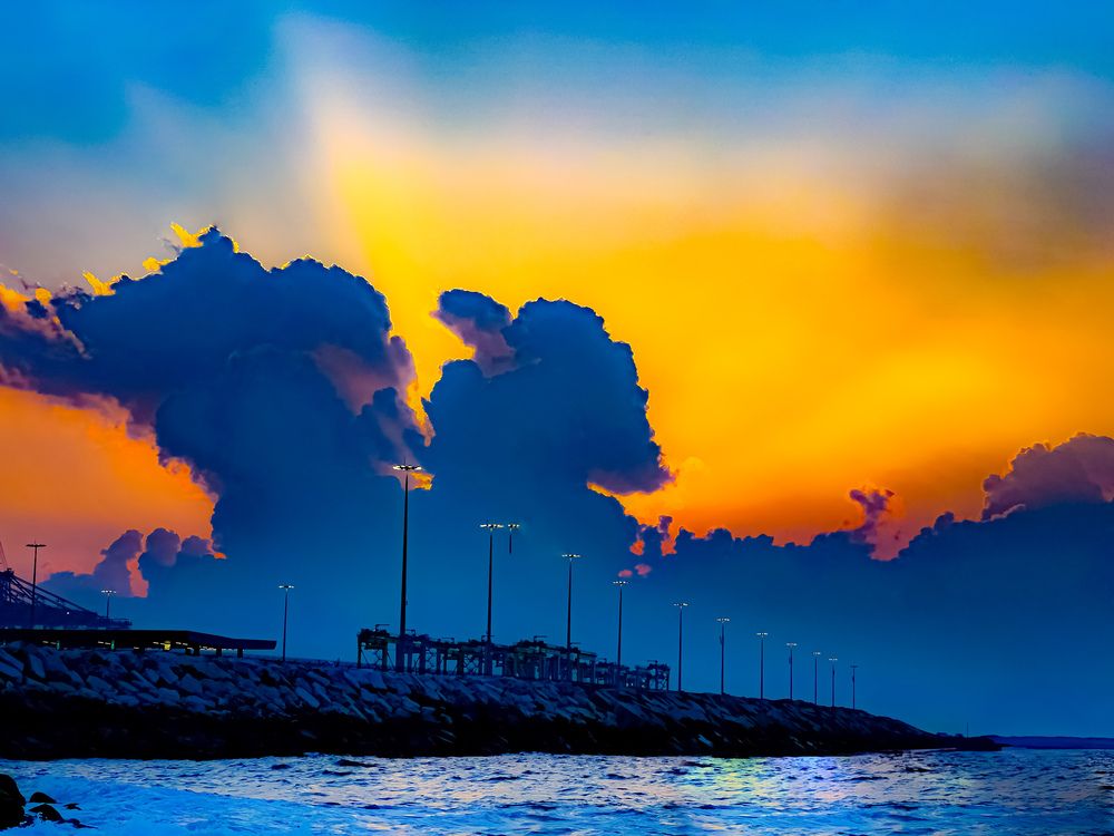 Sunset from the beach of Ashdod city in Palestine. Glory be to God, how the clouds resemble two lovers kissing each other.