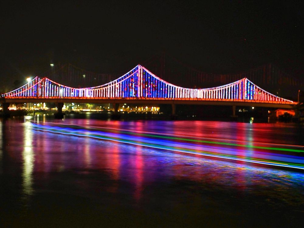 Illuminated Suspension Bridge at Night