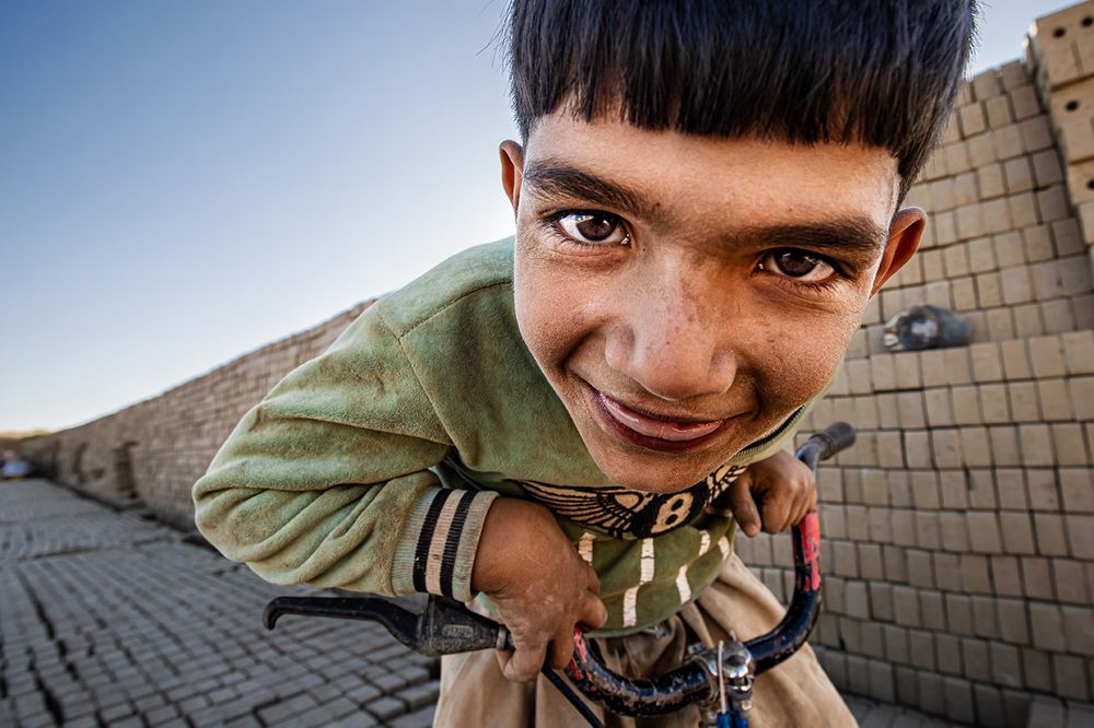 "The Smile of Life Amid Hardships"