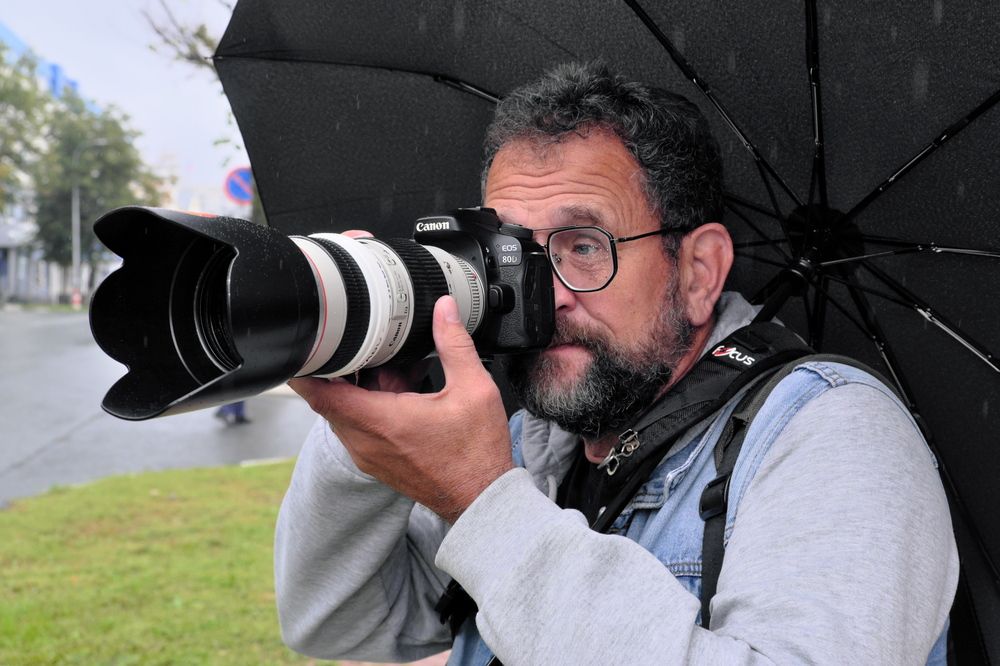 Фотожурналист.