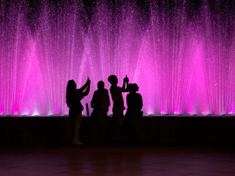 People near a fountain in the center of Tbilisi, Georgia.