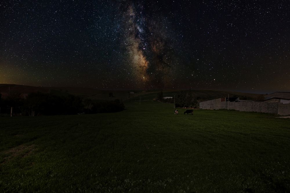 The Milky Way Over a Nighttime Rural Landscape
