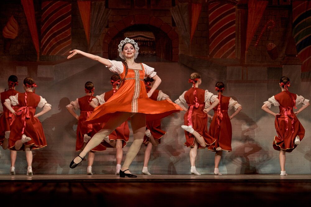A ballerina performs a folk dance in The Nutcracker