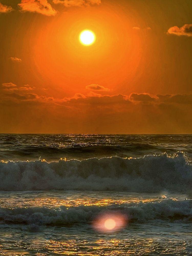 Sunset in waves