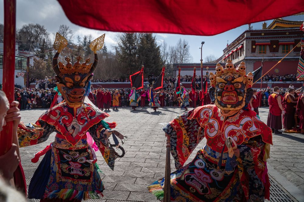 Masked Tibetan Monks