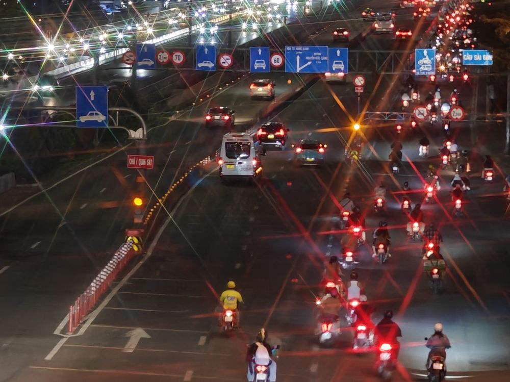 The lights and stars illuminating the road