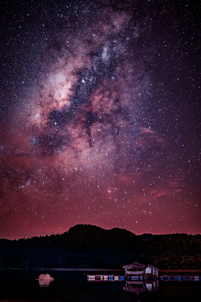 Galactic Glow over Tranquil Waters