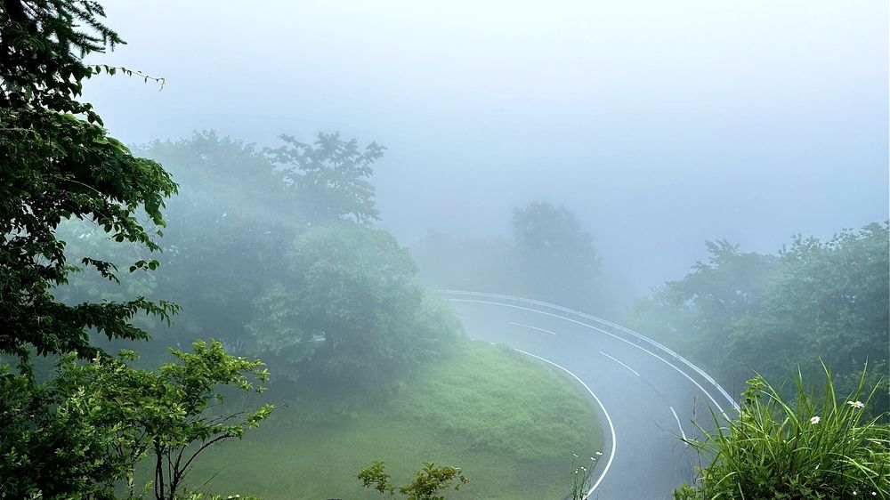 Foggy Road in the Mountains