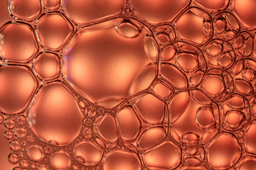 Red and Orange Macro Shot of Soap Bubble Texture